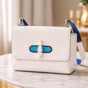 Thacker NYC purse in a crisp white croc embossed finish